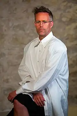 Tranter facing a camera