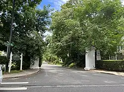 The Woodland Place entrance to Saddle Rock Estates on August 14, 2022.