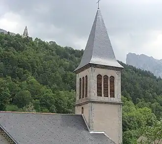 Saint-Disdier, with the parish church in the foreground, and the "Mother Church" on the hill