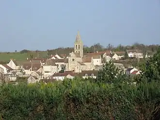 A general view of Santeuil, with the church and surrounding buildings