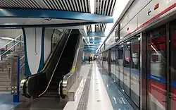 Capital Airport Express platform featuring streamlined shape of the station space