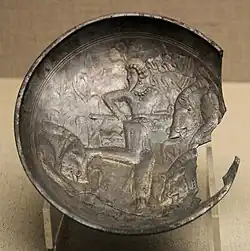 A probable Kushano-Sasanian plate with hunting scene, found in the 504 CE tomb of Feng Hetu in China. Shanxi Museum. It is dated the 3rd-4th century CE, and was probably manufactured in northern Afghanistan.[15][16][17]