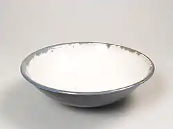 Plate white inside and blue glaze outside, 1940