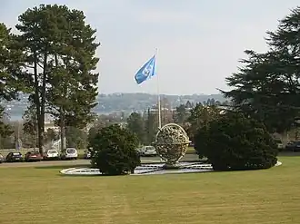 The Celestial Sphere Woodrow Wilson Memorial in the Ariana Park with Lake Geneva in the background.