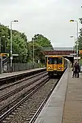 A Class 508 arrives with a service to Liverpool.