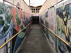 ramp with public art painted on walls