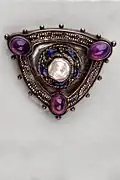 shield shaped brooch, with silver, amethyst and pearl