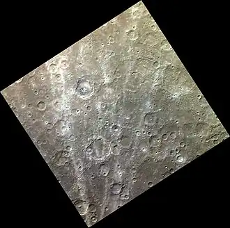 The region around Vincente in exaggerated color. The rays of Han Kan crater cross the scene.