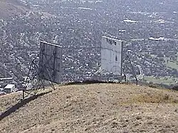 The two microwave radio reflectors directly below the summit. They were removed in late 2013.