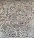 Bas-relief at Angkor Wat of a Hanuman style single leg headlock