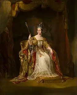 Victoria wears her crown and holds a sceptre.