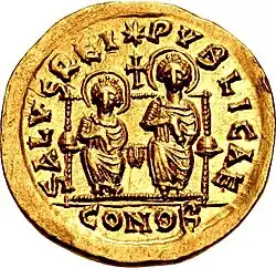 Gold coin showing two figures seated on a throne. Both are nimbate; there is a cross between them. The entire scene is encircled by text.