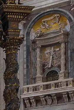 At right, two of the Solomonic columns brought to Rome by Constantine, in their present-day location on a pier in St. Peter's Basilica (Rome). In the foreground at left is part of Bernini's Baldachin, inspired by the original columns.