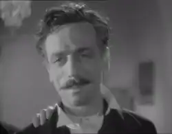 A man looking into the camera