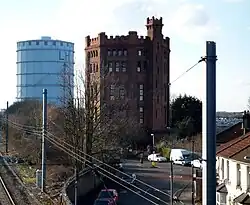 Redbrick water tower (which has now been converted into an apartment complex) alongside the former Southall gasometer
