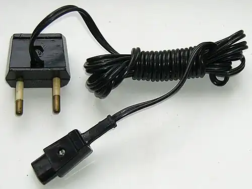 Soviet shaver power cord. The plug is similar to CEE&nbsp;7/16, but has different configuration. Thermoplastic plug is rated 6&nbsp;A and 250&nbsp;V.