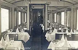 restaurant carriage, with tables set for dinner