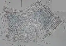 Plan drawn up for the St Katharine Dock Company showing the street and buildings which would need to be demolished to make way for the new dock