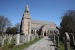 Path leading to St Machar's Cathedral's entrance with graves either side