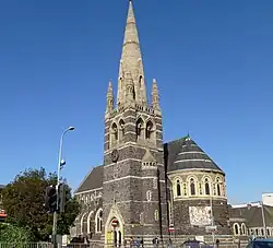 St Mark's Church, Belgrave Gate, Leicester, 1869–72 by Ewan Christian, showing the impressive chancel apse and south-east tower and spire[46]