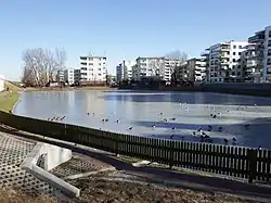 Appartment buildings around the Jeziorzec Pond in Górce, in 2015.