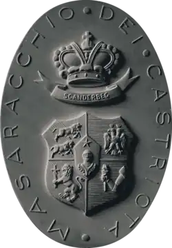 Coat of arms of the Muzaka and Kastrioti family in the 19th-century on the Niscemi palace gate.