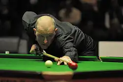 Steve Davis playing a trick shot exhibition during the break of the final