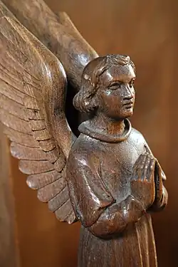 Choir stall carving by Cecil Greenwood Hare at St Peter's Church, Ealing