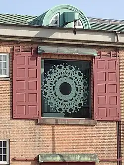 Sandblasted design in a window