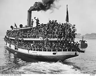 Leaving Fort Macquarie for Cockatoo Island with troops of the 1st Battalion AN&MEF, 1914
