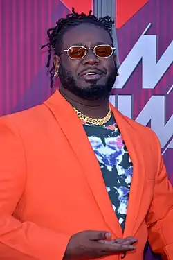 Image 25T-Pain was initially criticized for popularizing autotune, which is now considered an iconic trend of the decade. (from 2000s in music)