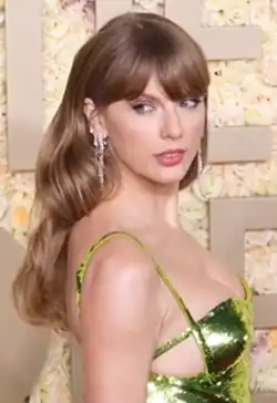 Taylor Swift in a green gown at the 81st Golden Globe Awards