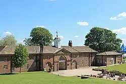 Photograph of the mid-18th century stable block at Temple Newsam showing the pediment