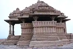 The lower level sculptures are defaced, some upper level survive