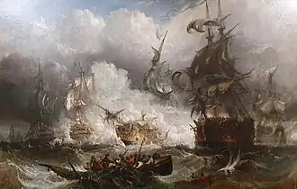 On a dark stormy sea beneath towering clouds, an indeterminate number of sailing warships battle. In the foreground are three ships, one to the right of the frame and one in the centre bridged by clouds of smoke as the mainmast of the far right ship, which bears a prominent horizontally striped flag is toppling. To the left of the frame and partially obscuring the central ship is a third vessel that drifts as flames leap from its deck.