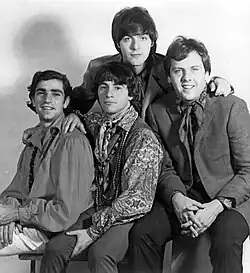 The band in 1969; standing in back: Dino Danelli; sitting in front (L-R): Felix Cavaliere, Eddie Brigati and Gene Cornish