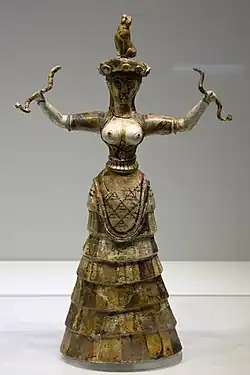 "Snake Goddess" figurine; 1460-1410 BC (from the Minoan Neo-palatial Period); faience; height: 29.5&nbsp;cm; from the Temple Repository at Knossos; Heraklion Archaeological Museum