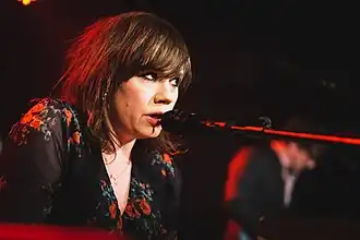 Dougall performing in 2022