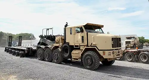 An Oshkosh M1070A1 HET and a DRS M1000 semi-trailer