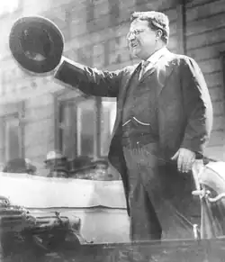 A photograph of Theodore Roosevelt speaking publicly shortly before the assassination attempt against him.