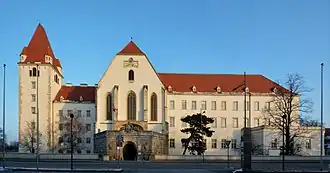A color photo of a large building, the Theresan Military Academy, as seen from the outside