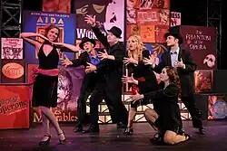 The Tibbits Summer Theatre cast in action on stage