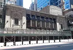 Times Square Theatre under renovation with a sidewalk shed infront of it