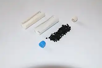 Disassembled smoking pipe filter. 9&nbsp;mm charcoal. One-sided.