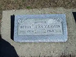 A color photograph of the headstone of Betty Jean Gravilin, Mother, who was born in 1924 and died in 1964. The headstone is a simple, yet respectful, marker for a deceased loved one.