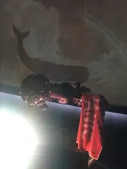 A star projector adorned with a towel on Towel Day. Planetarium Laupheim.