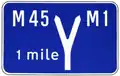 First advance direction sign for a junction of two motorways.