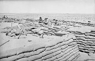 Soldiers in sandbag construction