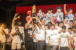 UP Fighting Maroons men's basketball with 22nd UP president Angelo Jimenez during UAAP Season 87