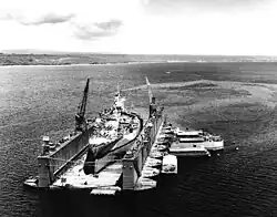 AFDB-1 with USS&nbsp;West Virginia in for repairs off Aessi Island on 13 November 1944